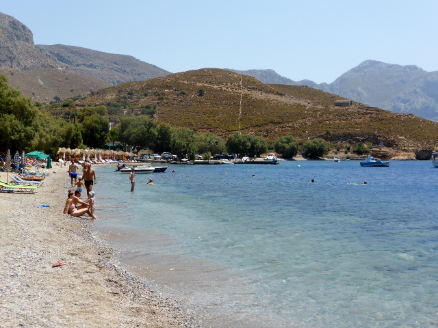 Emporios Beach with a few moorings for yachts