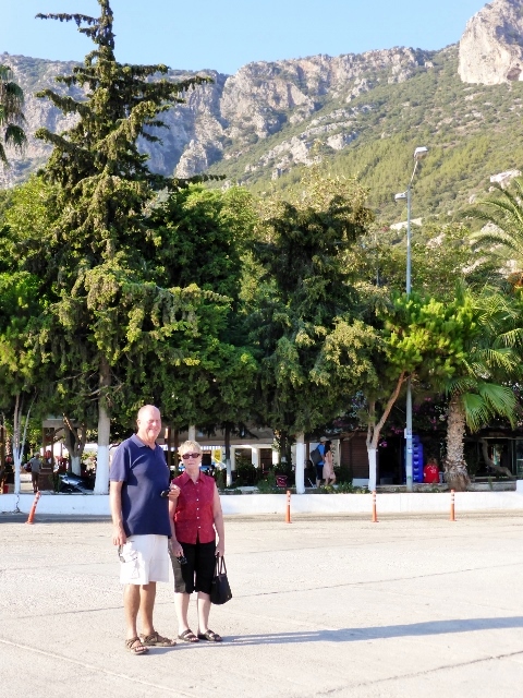 James and Lesley at Republic Square, with mountains rising in the background 