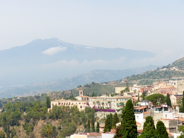 Mount Etna is our backdrop. Today she was shrouded in mist and clouds.